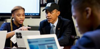 President Obama learns to write code alongside student Adrianna Michell in Newark, NJ.