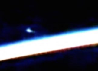 ISS captures UFO hovering Earth.