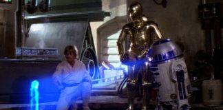 Luke-Skywalker-and-C-3PO-watch-R2-D2-display-a-hologram-of-Princess-Leia-in-Star-Wars-A-New-Hope