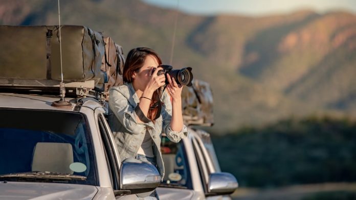 Female Photographer Taking Pictures