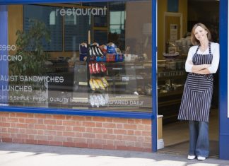 Woman Small Business Owner Standing by the Door