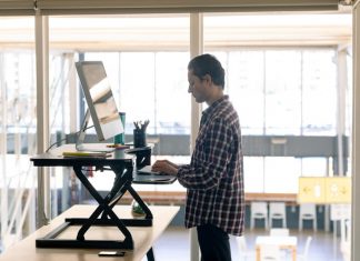 Employee Working on Standing Desk